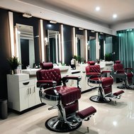 luxury-salon-with-a-lot-of-furtniture-barber-chair-shampoo-unit-hairdressers-chair.jpeg